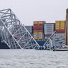 Hiện trường vụ sập cầu Francis Scott Key ở thành phố Baltimore, bang Maryland (Mỹ), sau khi bị tàu chở hàng đâm trúng, ngày 27/3. (Ảnh: AFP/TTXVN)