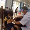 Khám sàng lọc cho trẻ em dân tộc thiểu số. (Ảnh: Nguyên Linh/TTXVN)