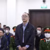 Bị cáo Đỗ Quốc Hùng (cựu Giám đốc BIDV chi nhánh Thành Đô) tại tòa. (Ảnh: Kim Anh/TTXVN)