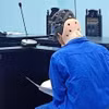 Bị cáo Nguyễn Chí Dũng bị đưa ra xét xử tại phiên tòa. (Nguồn: Báo An ninh Thủ đô)