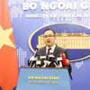Phó Phát ngôn Bộ Ngoại giao Nguyễn Đức Thắng chủ trì Họp báo tháng 3. (Ảnh: Thu Phương/TTXVN phát)
