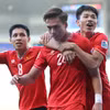 Tuyển Việt Nam thi đấu quả cảm trong ngày chia tay Asian Cup 2023. (Ảnh: Hoàng Linh/TTXVN)