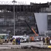 Hiện trường vụ tấn công khủng bố tại nhà hát Crocus City Hall ở Moskva, Nga, ngày 26/3 vừa qua. (Ảnh: AFP/TTXVN)