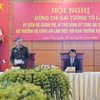 Đại tướng Tô Lâm, Bộ trưởng Bộ Công an và Bí thư Tỉnh ủy Lào Cai Đặng Xuân Phong chủ trì buổi làm việc. (Ảnh: TTXVN phát)