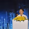 Ông Dương Anh Đức, Phó Chủ tịch UBND thành phố Hồ Chí Minh, thông tin về chiến lược phát triển đô thị thông minh tại hội thảo. (Ảnh: Mỹ Phương/TTXVN)