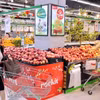 Người dân mua sắm tại siêu thị WinMart Võ Thị Sáu, quận Hai Bà Trưng, Hà Nội. (Ảnh: Trần Việt/TTXVN)