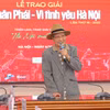 Đạo diễn Trần Văn Thủy phát biểu tại lễ trao giải. (Ảnh: PV/Vietnam+)
