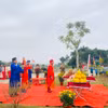 Trung tâm Bảo tồn di sản Thành nhà Hồ thực hiện các nghi lễ tái hiện lễ thượng nêu ngày Tết. (Ảnh: Hoa Mai/TTXVN)