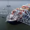 Tàu container Dali treo cờ Singapore đâm sập cầu Francis Scott Key ở thành phố Baltimore, bang Maryland (Mỹ), ngày 26/3/2024. (Ảnh: AFP/TTXVN)