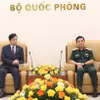 Đại tướng Phan Văn Giang và Ngài Kim Seon Ho tại buổi tiếp. (Ảnh: Hồng Pha/TTXVN phát)