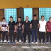 Các đối tượng trong đường dây cá độ bóng đá bị bắt giữ. (Ảnh: TTXVN phát)