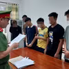 Cơ quan Cảnh sát Điều tra - Công an tỉnh Bà Rịa-Vũng Tàu đọc quyết định bắt tạm giam đối với 6 bị can. (Ảnh: Công an cung cấp)