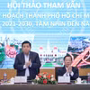 Bộ trưởng Nguyễn Chí Dũng gợi mở các nội dung tại Hội thảo tham vấn quy hoạch Thành phố Hồ Chí Minh thời kỳ 2021-2030, tầm nhìn đến năm 2050, ngày 28/2. (Ảnh: Vietnam+)