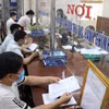 Nghị định số 126/2020/NĐ-CP ngày 19/10/2020 của Chính phủ đã có quy định chi tiết về các trường hợp cá nhân cư trú ủy quyền quyết toán thuế thu nhập cá nhân cho đơn vị làm việc. (Ảnh: Vietnam+)