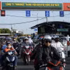 Người dân qua phà Cát Lái trở về Thành phố Hồ Chí Minh trong chiều mùng 5 Tết. (Ảnh: Tiến Lực/TTXVN)