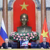 Chủ tịch nước Tô Lâm và Tổng thống Liên bang Nga Vladimir Putin tại cuộc họp báo chung. (Ảnh: Nhan Sáng/TTXVN)
