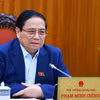 Thủ tướng Phạm Minh Chính chủ trì họp Thường trực Chính phủ về kiểm soát lạm phát. (Ảnh: Dương Giang/TTXVN)
