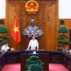 Thủ tướng Phạm Minh Chính chủ trì làm việc với các bộ, ngành, địa phương để đẩy nhanh tiến độ hoàn thành Dự án đường dây tải điện 500kV mạch 3. (Ảnh: Dương Giang/TTXVN)