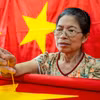Làng nghề may, thêu cờ lớn nhất Hà Nội tất bật trước ngày Quốc khánh