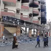 Các tòa nhà bị phá hủy sau cuộc không kích của Israel xuống Dải Gaza ngày 19/1/2024. (Ảnh: THX/TTXVN)
