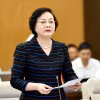 Bộ trưởng Bộ Nội vụ Phạm Thị Thanh Trà trình bày tóm tắt các tờ trình. (Ảnh: Doãn Tấn/TTXVN)