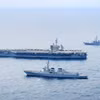 Tàu khu trục Seoae Ryu Seong-ryong của Hàn Quốc, tàu sân bay chạy bằng năng lượng hạt nhân USS Theodore Roosevelt của Mỹ và tàu khu trục Ariake của Nhật Bản tham gia cuộc tập trận chung ngoài khơi đảo Jeju (Hàn Quốc), ngày 11/4/2024. (Ảnh: Yonhap/TTXVN)