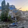 Bức ảnh cho thấy thiệt hại tại thành phố Sudzha ở vùng Kursk sau các vụ bắn phá của phía Ukraine. (Nguồn: AP)