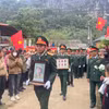 Lễ đón nhận hài cốt liệt sỹ Hứa Kim Chiểu, quân tình nguyện Việt Nam hy sinh ở chiến trường nước Cộng hòa Dân chủ Nhân dân Lào. (Ảnh: TTXVN phát)