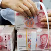 Đồng 100 nhân dân tệ của Trung Quốc. (Ảnh: AFP/TTXVN)