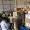 Lực lượng chức năng tỉnh An Giang kiểm tra hàng hóa. (Ảnh: PV/Vietnam+)