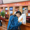 Người dân được phục vụ tốt hơn nhờ đẩy mạnh công tác Chuyển đổi Số. (Ảnh: PV/Vietnam+)
