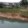 Sạt lở bờ sông tại khu 13, xã Dân Quyền, huyện Tam Nông, tỉnh Phú Thọ. (Ảnh: Tạ Toàn/TTXVN)