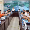 Lãnh đạo EVN chủ trì cuộc họp giao ban quý 3/2023 về tiến độ thi công xây dựng Nhà máy Thủy điện Hòa Bình mở rộng. (Ảnh: Đức Duy/ietnam+)