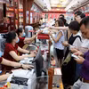 Giao dịch vàng tại doanh nghiệp. (Ảnh: PV/Vietnam+)