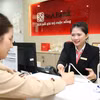 Giao dịch tại SeABank. (Ảnh: Vietnam+)