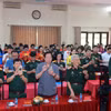 Các đại biểu nhắn tin tại buổi phát động. (Ảnh: PV/Vietnam+)