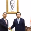Phó Thủ tướng Trần Lưu Quang tiếp ông Gao Jifan, Chủ tịch Hội đồng Quản trị kiêm Giám đốc Điều hành Tập đoàn Trina Solar, Trung Quốc. (Ảnh: Lâm Khánh/TTXVN)