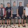 Các đối tượng tại cơ quan Công an. (Ảnh: TTXVN phát)