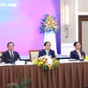Thủ tướng Phạm Minh Chính, Thủ tướng Lào Sonexay Siphandone (thứ hai, từ trái sang) cùng Tổng Thư ký ASEAN Kao Kim Hourn (ngoài cùng, bên trái) tham dự Tọa đàm với doanh nghiệp ASEAN và đối tác. (Ảnh: Dương Giang/TTXVN)