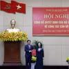 Thường trực Ban Bí thư Trương Thị Mai trao quyết định cho ông Lương Nguyễn Minh Triết. (Ảnh: Trần Tĩnh/TTXVN)