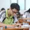 Thí sinh làm bài thi. (Nguồn: TTXVN)