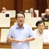 Bộ trưởng, Chủ nhiệm Ủy ban Dân tộc Hầu A Lềnh giải trình làm rõ chất vấn của đại biểu Quốc hội. (Ảnh: Phương Hoa/TTXVN)