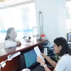 Doanh nghiệp đến thực hiện giao dịch tại Cục Thuế Tây Ninh. (Ảnh minh họa: Minh Phú/TTXVN)