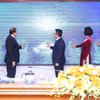 Các đại biểu thực hiện nghi thức phát động Giải thưởng ảnh và video clip 'Công nghệ từ trái tim - Technology with heart.' (Ảnh: An Đăng/TTXVN)