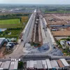 Đường dẫn vào Khu công nghiệp VSIP Cần Thơ tại nút giao với Quốc lộ 80. (Ảnh: Thanh Liêm/TTXVN)