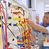 Hệ thống máy móc, thiết bị đào tạo hiện đại được tập trung đầu tư đồng bộ tại Quảng Ninh sau khi sáp nhập các cơ sở giáo dục nghề nghiệp. (Ảnh: TTXVN phát)