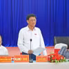 Chủ tịch Hội đồng Dân tộc của Quốc hội Lâm Văn Mẫn đánh giá cao những kết quả mà xã Khánh Lâm đạt được trong việc triển khai các chính sách đặc thù thời gian qua. (Ảnh: Huỳnh Anh/TTXVN)