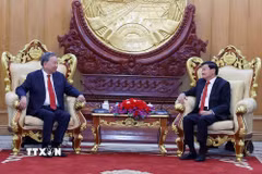 Tổng Bí thư Tô Lâm và Tổng Bí thư, Chủ tịch nước Lào Thongloun Sisoulith gặp hẹp. (Ảnh: Thống Nhất/TTXVN)