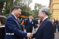 Tổng Bí thư Tô Lâm đón Tổng Bí thư, Chủ tịch nước Trung Quốc Tập Cận Bình. (Ảnh: Thống Nhất/TTXVN)