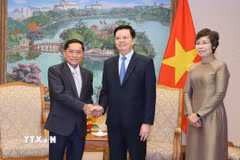 Phó Thủ tướng Mai Văn Chính tiếp Tổng giám đốc Thông tấn xã Pathet Lào Vannasin Simmavong. (Ảnh: Văn Điệp/TTXVN)